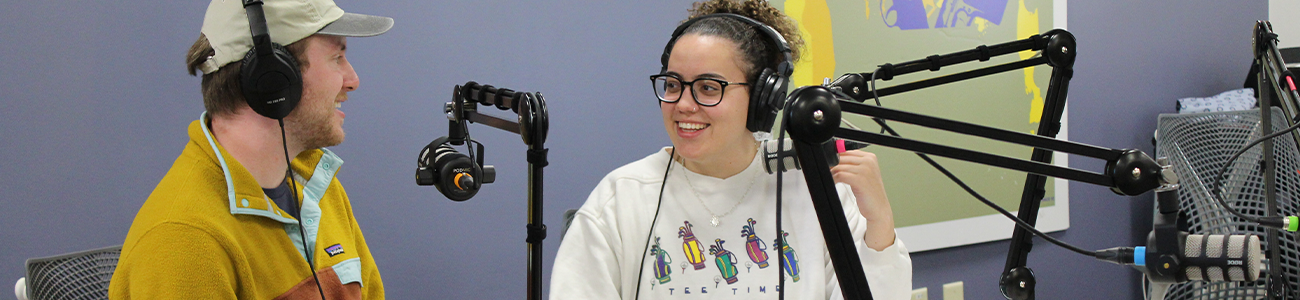 Two students record a podcast in the Reeder Media Center
