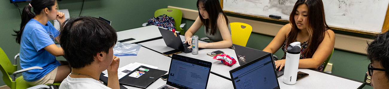 Students studying together in a group study room