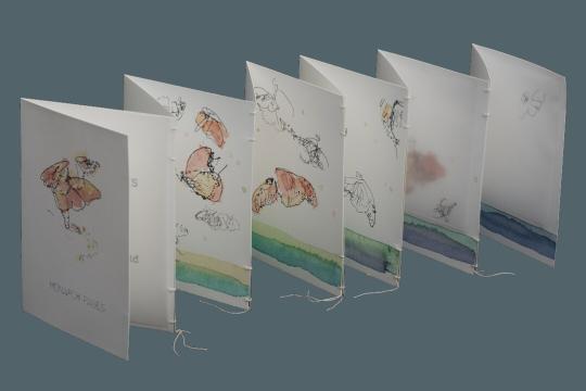 Accordian folding zine with watercolor illustrations of monarch butterflies