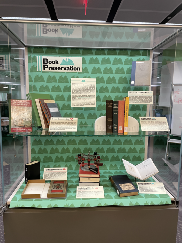 Exhibit case with books for Library Preservation Week