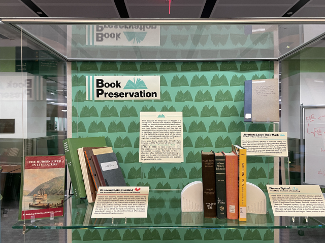 Exhibit case with books for Library Preservation Week