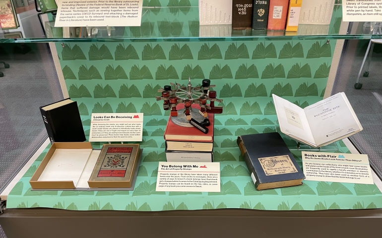 Exhibit case with books for Library Preservation Week