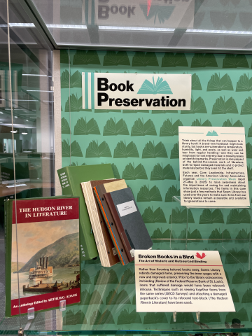 Exhibit case with books for Library Preservation Week