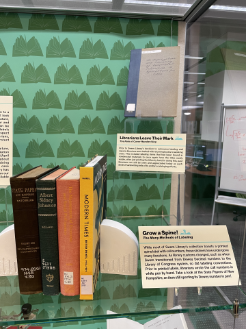 Exhibit case with books for Library Preservation Week
