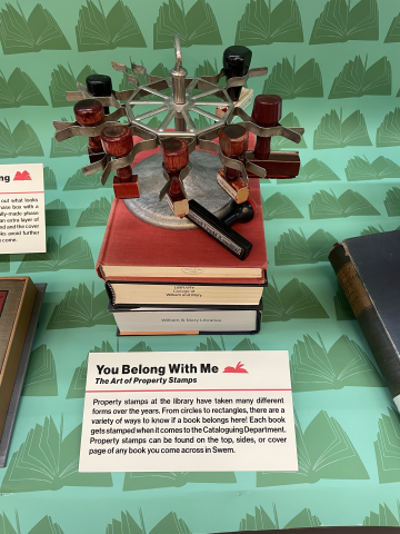 Exhibit case with books for Library Preservation Week