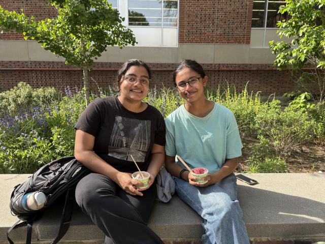 two students eating ice cream