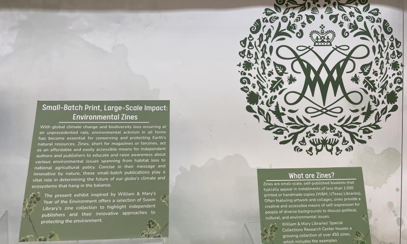 Photo of labels with introductory text about the exhibit and genre of zines