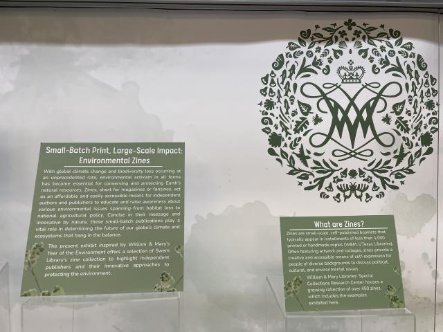 Photo of labels with introductory text about the exhibit and genre of zines