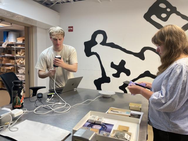 Andrew Francois taking images of artifacts at Jamestown Rediscovery