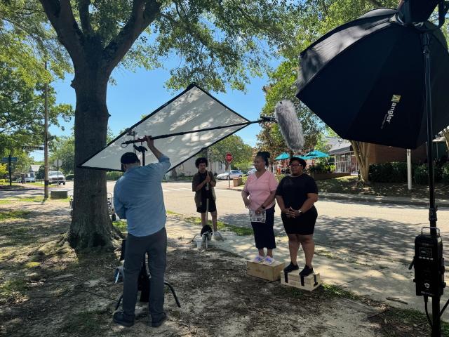 Johnella and Andrea filming for documentary outside