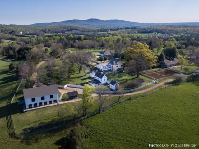 aerial view of former plantation named Highland in the early spring Green trees and rolling hills