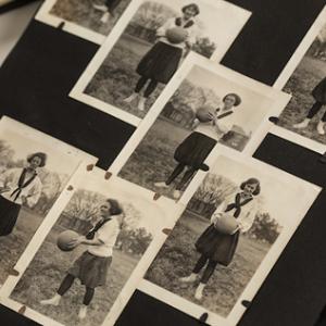 Scrapbook with photos of women playing sports