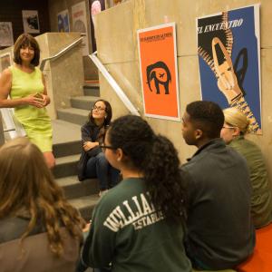Ann Marie Stock speaks to a group of students in the Botetourt Gallery