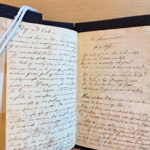 A student's commonplace book with a page titled Dog and Cat