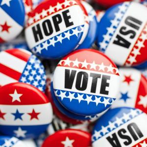 Buttons in red, white and blue with the words Vote, Hope and USA