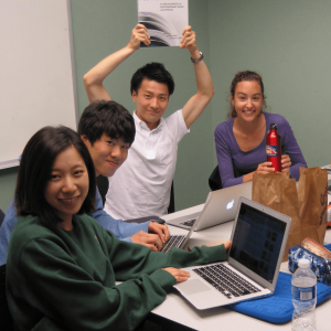 Students from Keio University work together in a study room