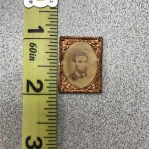 One inch tall framed portrait of Lincoln