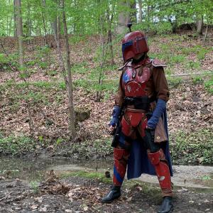 Student dressed in mandolorian armor made in the Makerspace