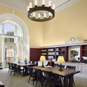 Interior of the Business Library with a person at work