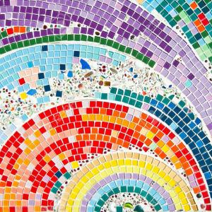 Mosaic comprised of multicolored arcs