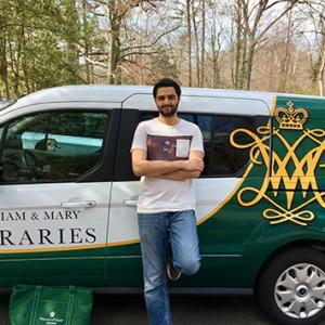 Nic Deangio in front of the Swem delivery van