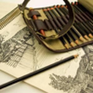 Closeup of an artist's pencil case and drawing