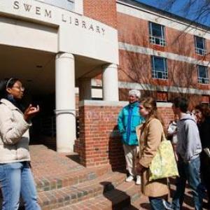 Student leads a tour of the library