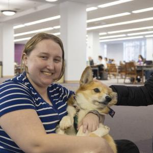 Student with corgi